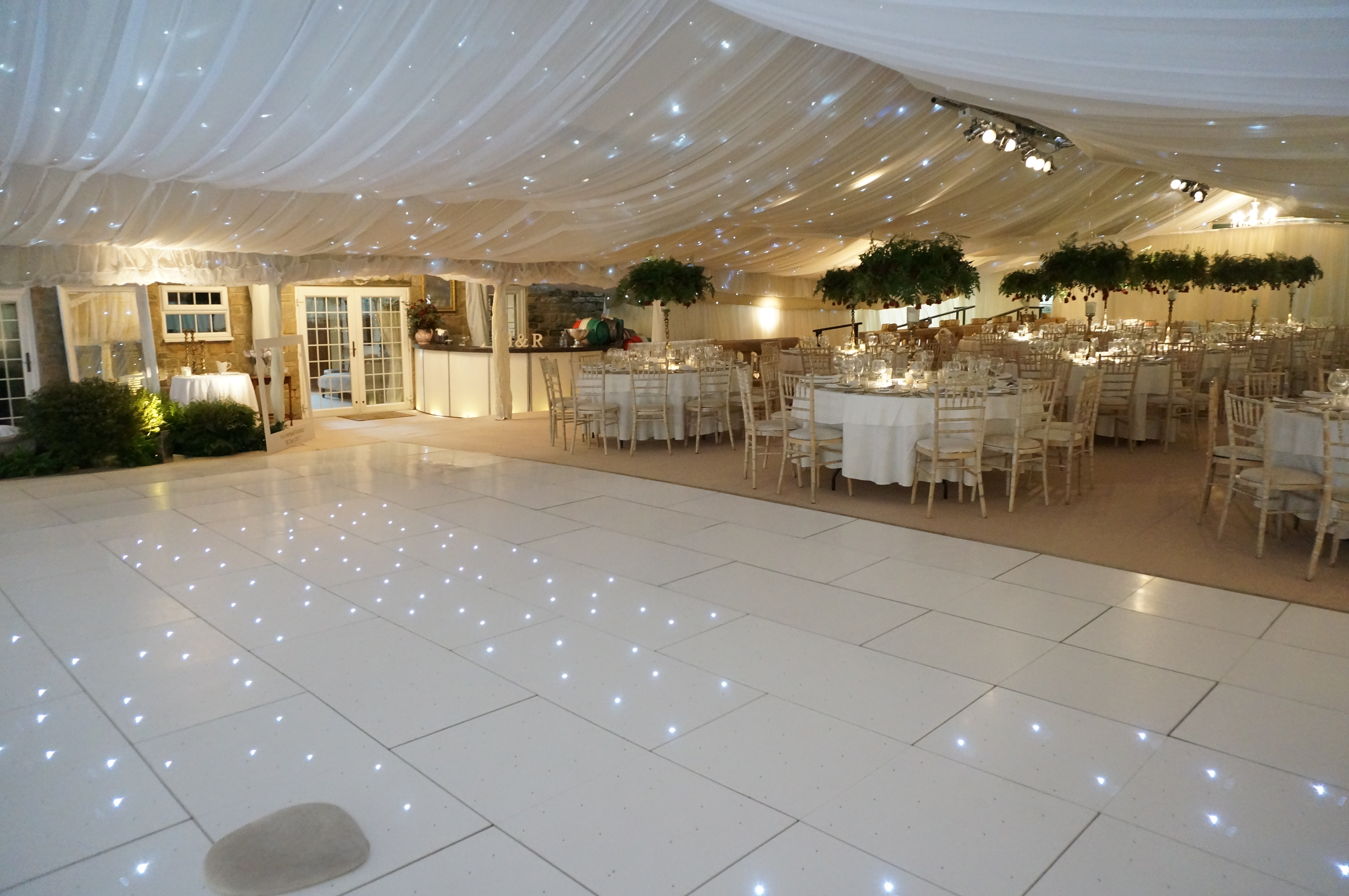 Marquee fully lined with starlight celing lining and dance floor.